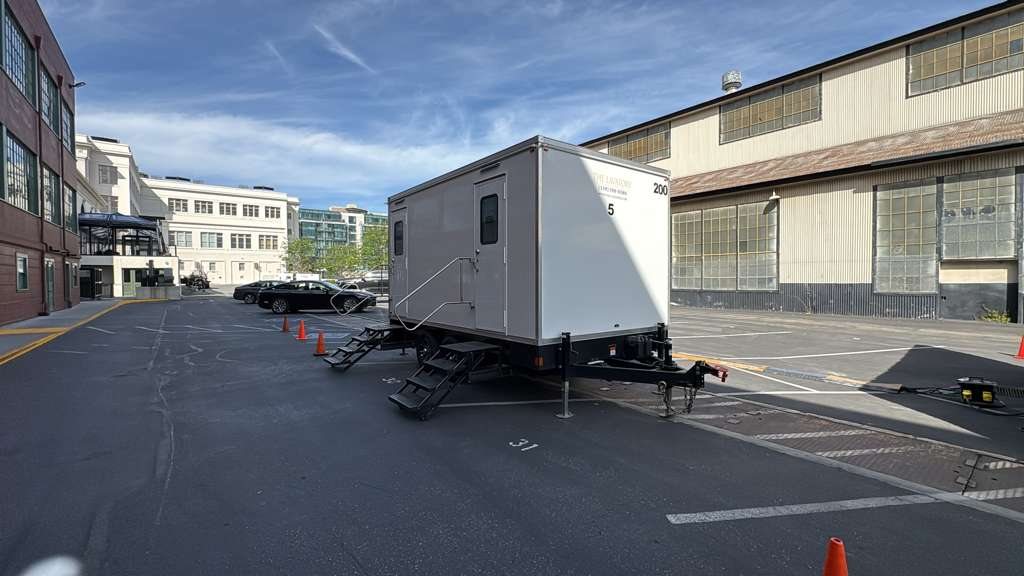 5 station restroom trailer in the parking lot (restroom trailer rental, Arizona)
