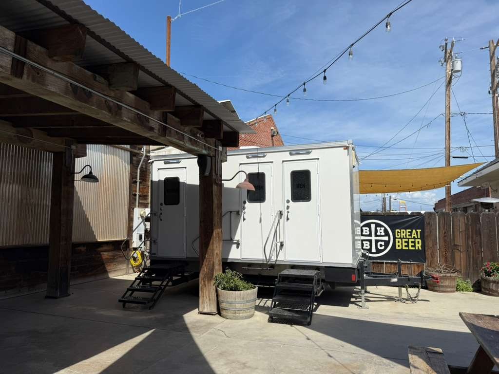 3 station restroom trailer staged at the brewery venue, an Arizona restroom trailer rental job