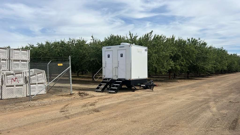 2 station restroom trailer in the agricultural field (restroom trailer rental, Arizona)