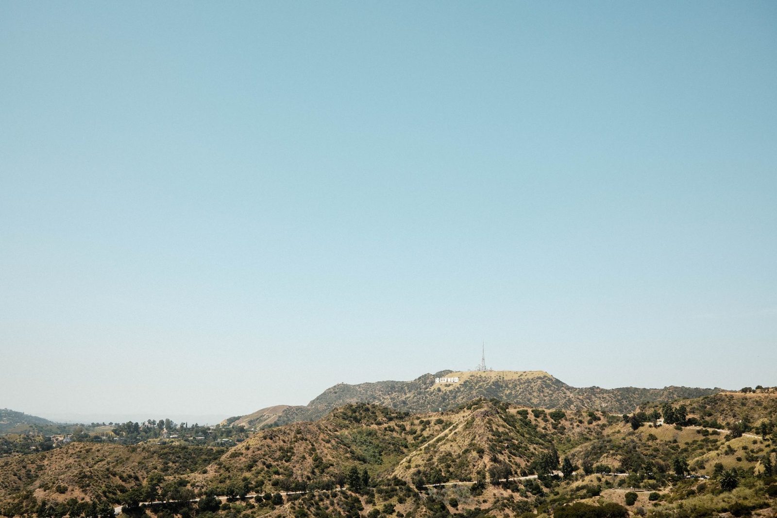The Hollywood Hills under a hazy sky