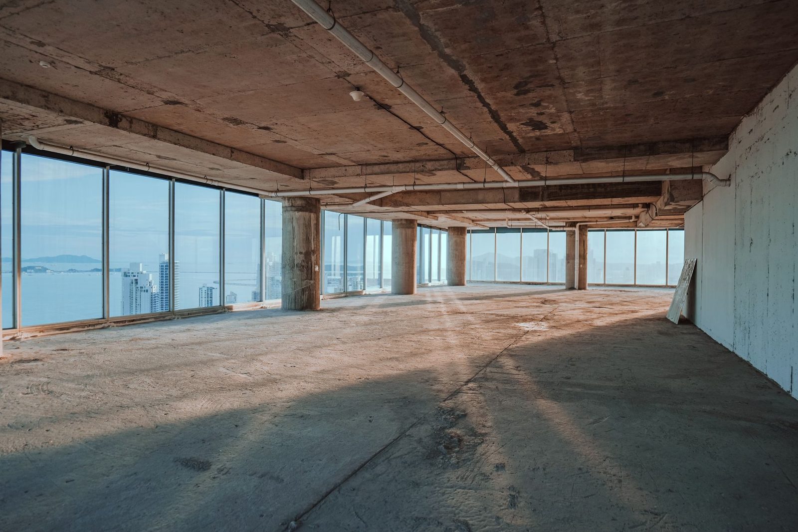 An office floor stripped to the concrete for a renovation
