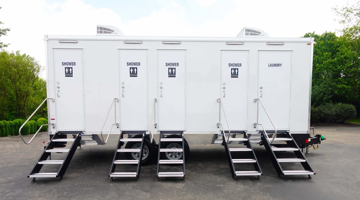 Shower, restroom and laundry combo trailer that covers a full crew's daily hygiene from one placement