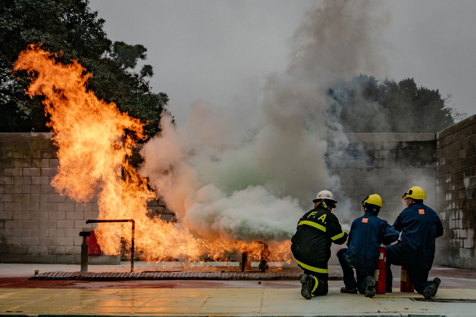 Firefighters working a live fire training exercise