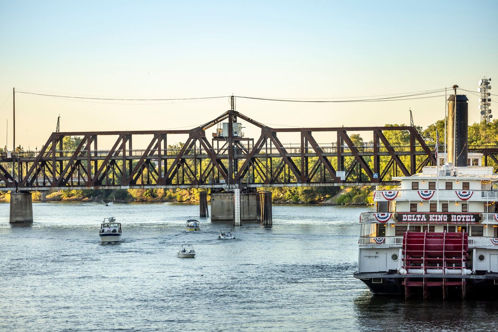The Delta King riverboat and a bridge on the Sacramento River