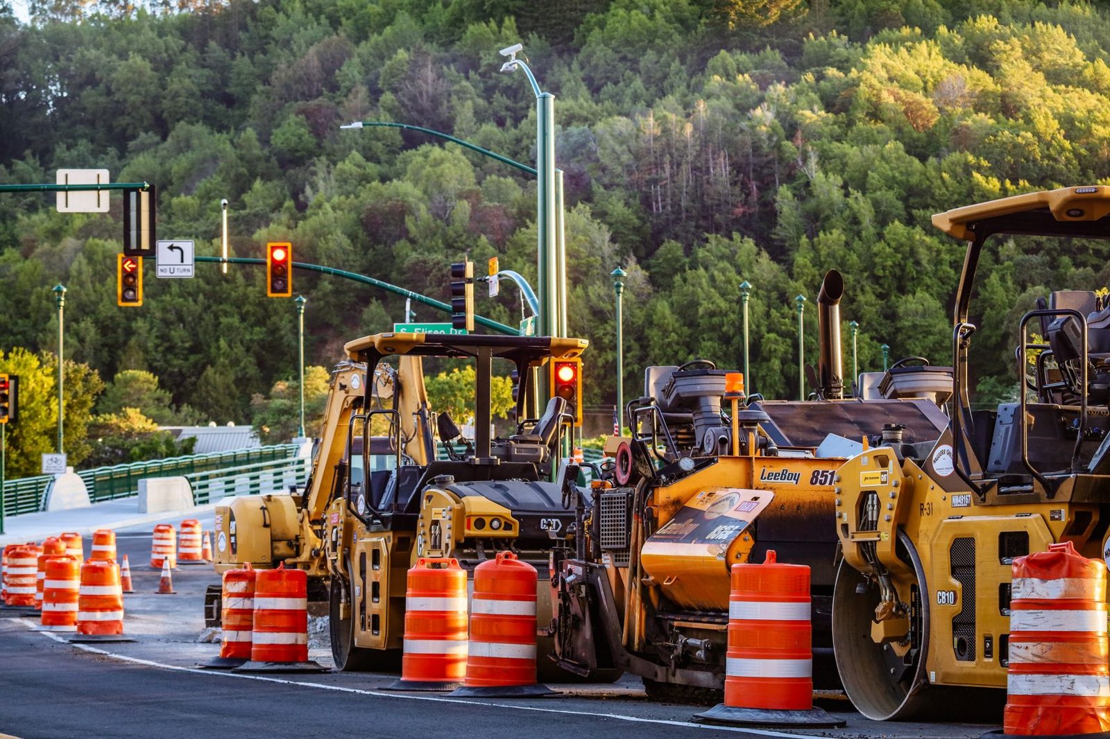 Orange cones and equipment in a highway work zone