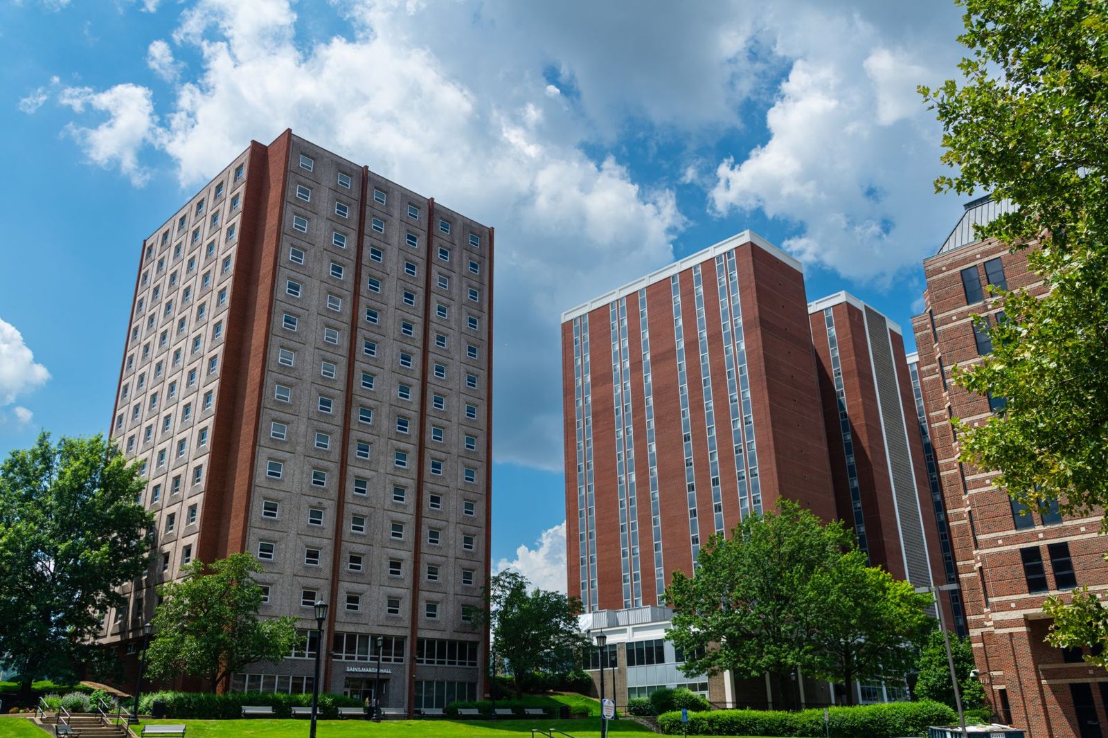 Brick residence hall towers on a campus