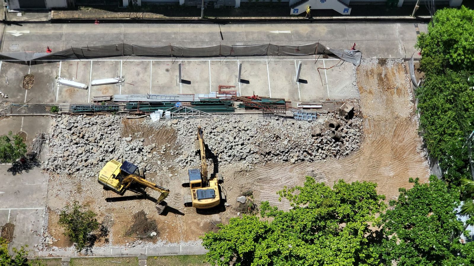 A drone view of excavators working a gravel construction lot