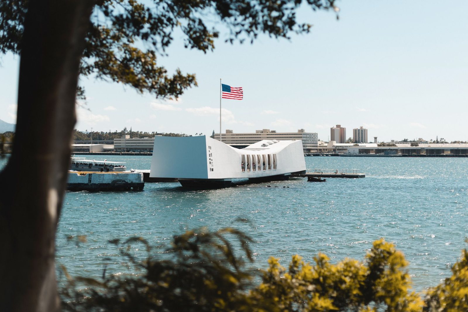 The USS Arizona Memorial on the water at Pearl Harbor