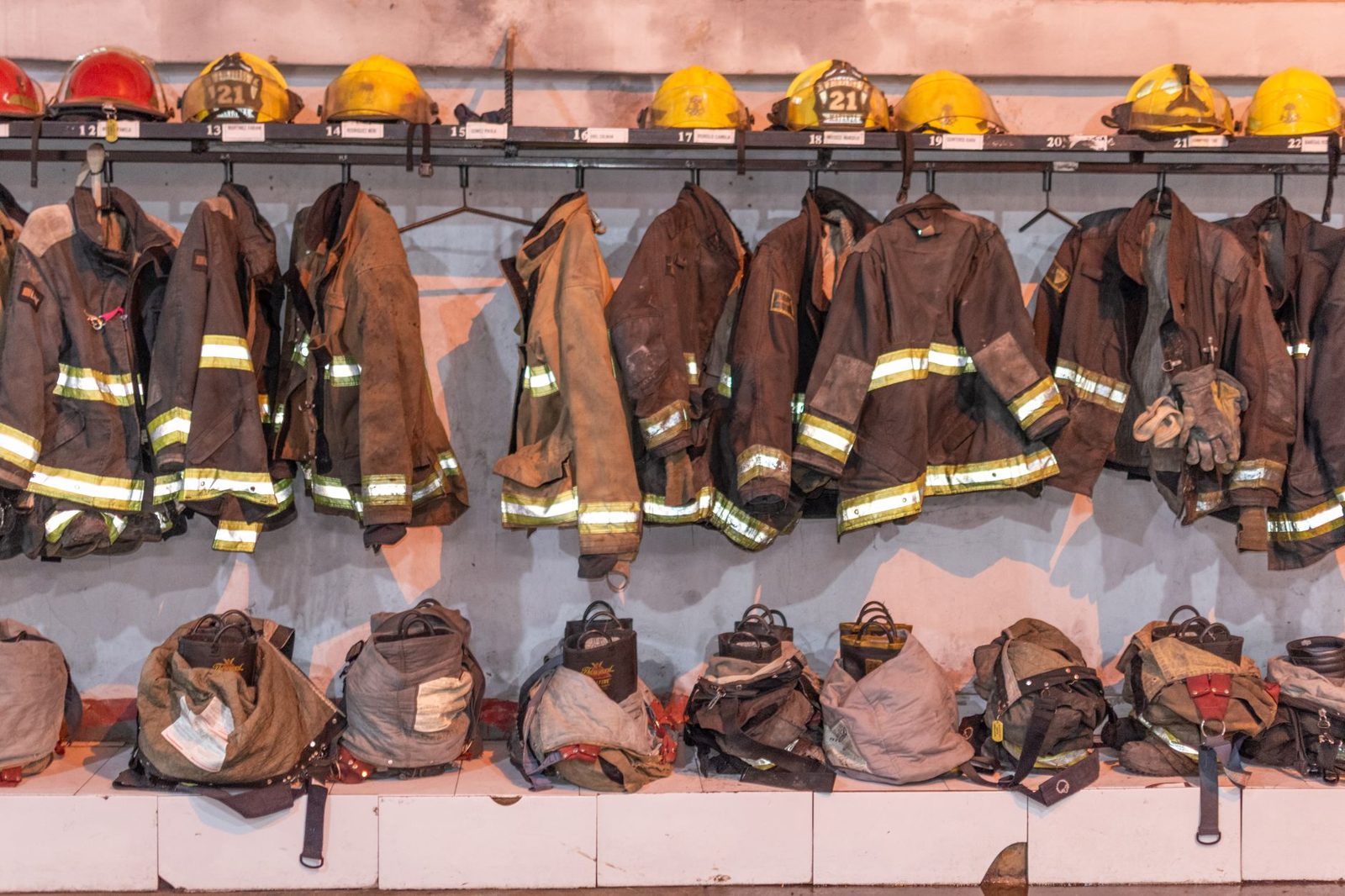 Firefighter protective gear hanging after a shift